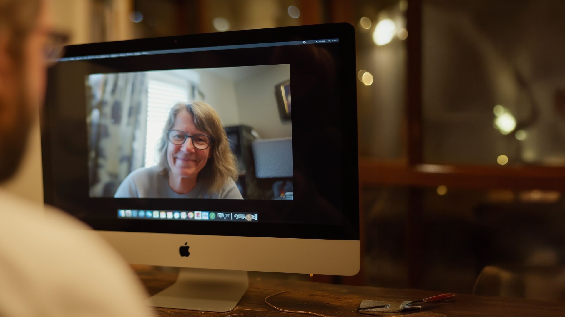 Woman on a teletherapy video session from her home
